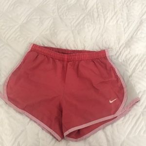 Nike XS (youth medium) coral shorts